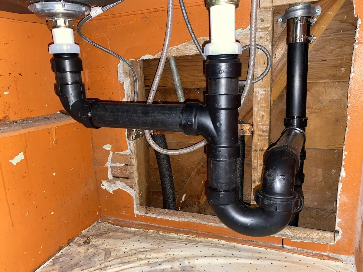 Professional Garbage Disposal Repair equipment and tools on the job in Delaware